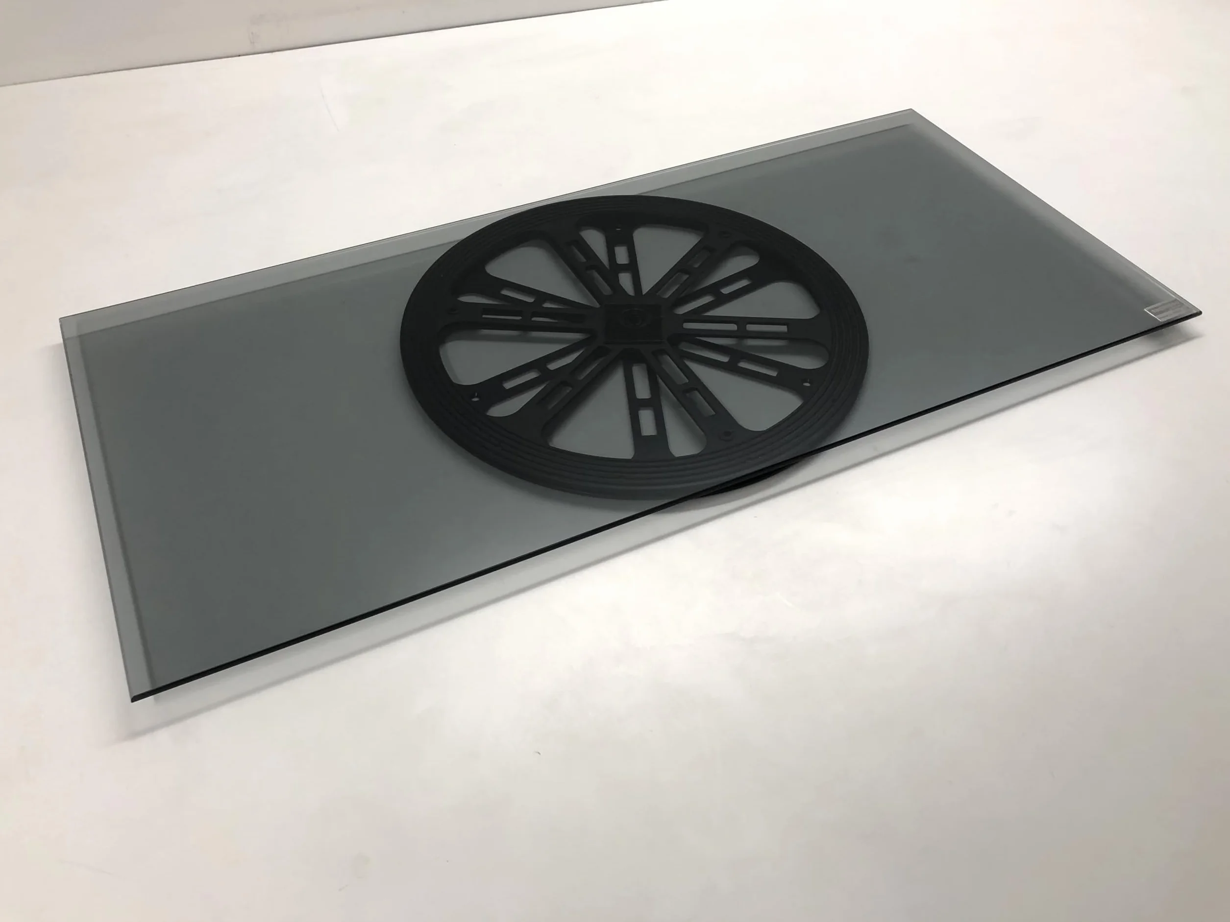 tecnidea Base girevole in vetro temperato colore Nero fumè, GK70N, dim: cm 70x32 - portata max. kg 40 - gira con un dito.